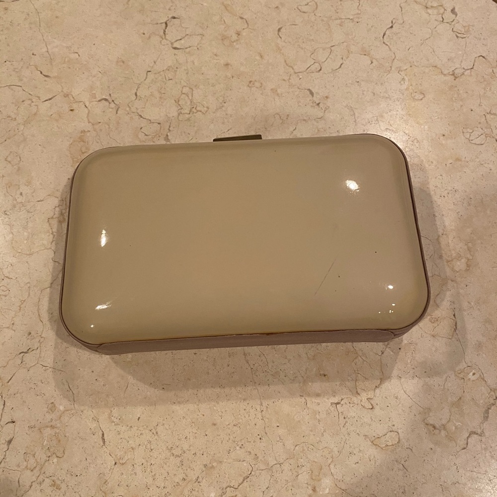 Cream colored clutch